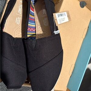 TOMS Classic Black Canvas Slip-Ons